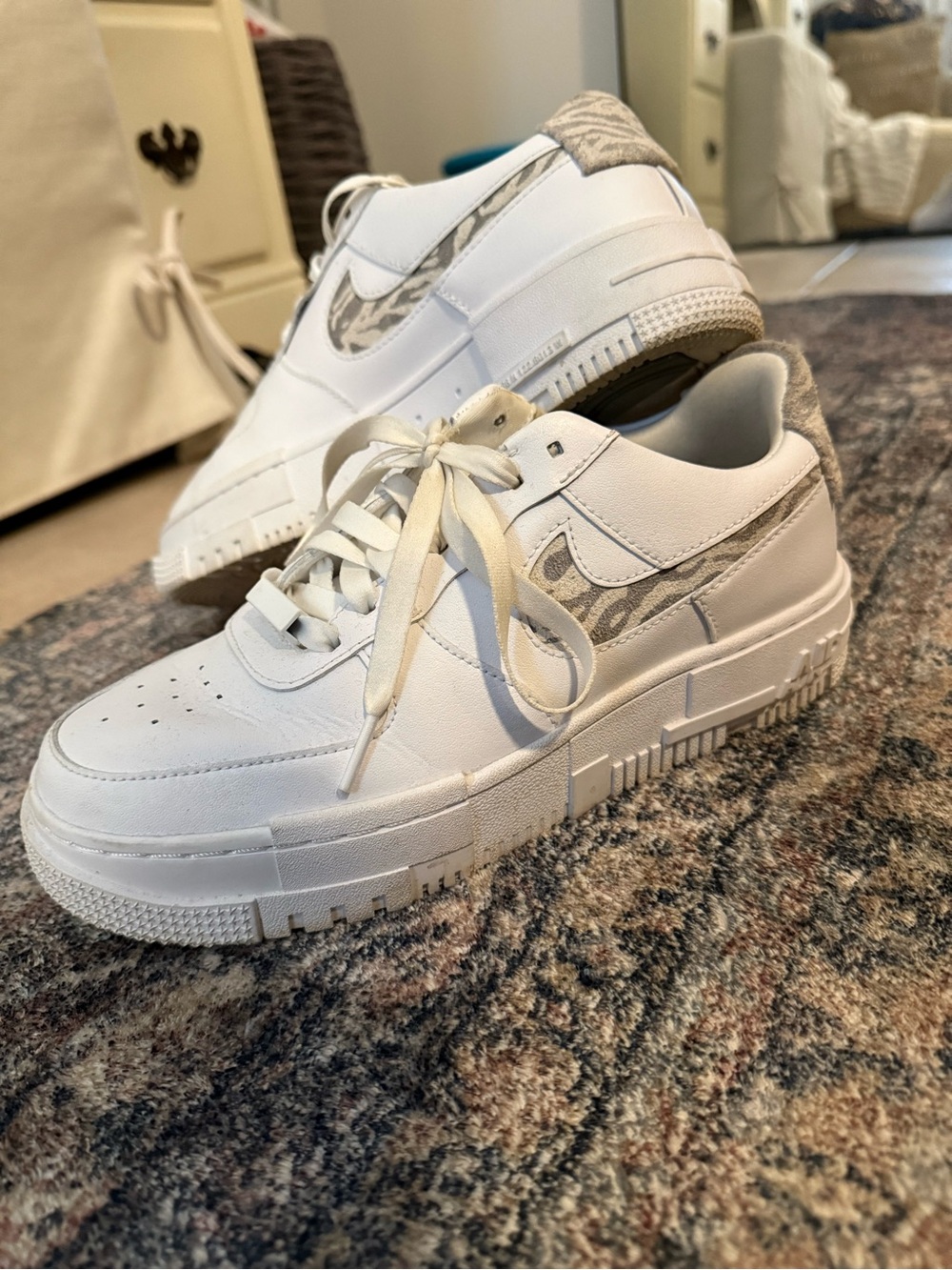 Nike Women’s Air Force Ones—White Sneakers with Zebra Swoosh Accent